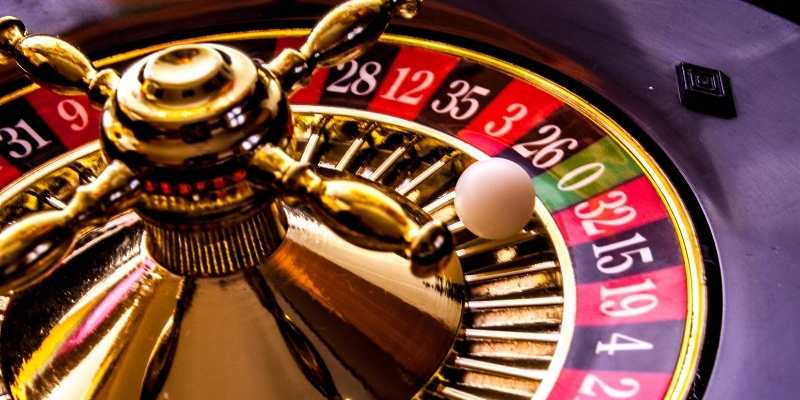 a roulette table spinning with the ball a roulette table spinning with the ball