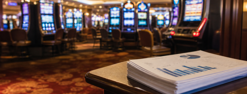 Delaware casino revenue report beside an unbranded casino floor