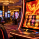Editorial illustration for AGS Rakin Bacon Slot: New Glō Upright 43 Games Highlight Cabinet Refresh