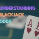 Understanding blackjack odds text with ace and king of hearts cards